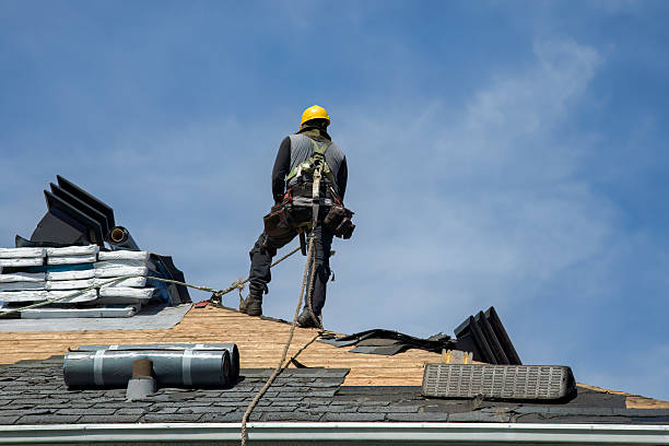 Professional Storm Damage Roof Repair technician working in Godley, TX
